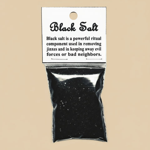 Black salt package with text on a white background