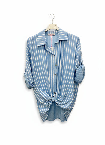 A long-sleeved striped shirt in baby blue color, displayed on a hanger against a white background.
