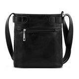 Black leather crossbody bag on a white background