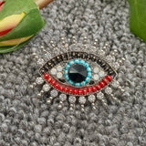 Sparkling Rhinestone Devil's Eye Brooch: Golden