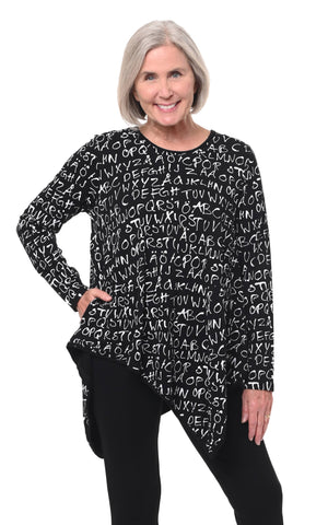 Woman wearing a black tunic with white text pattern on a white background