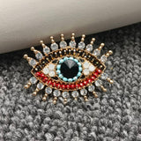 Sparkling Rhinestone Devil's Eye Brooch: Golden