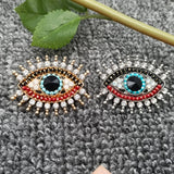 Sparkling Rhinestone Devil's Eye Brooch: Golden