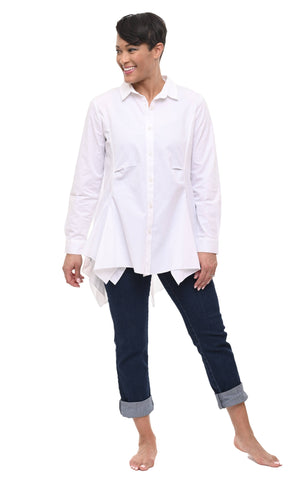Woman wearing a white shirt and dark blue pants on a white background
