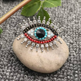 Sparkling Rhinestone Devil's Eye Brooch: Golden