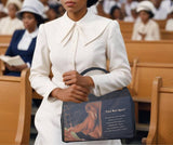 Woman holding a bag with a design and text in a church setting