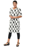 Woman wearing a white dress with black abstract pattern on a white background
