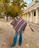 Multicolor Textured Knit Poncho with Fringe: Black