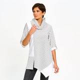Woman wearing a black and white striped shirt on a white background