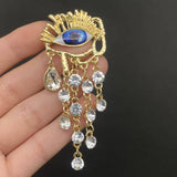 Rhinestone Fringe Eye Brooch