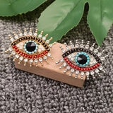 Sparkling Rhinestone Devil's Eye Brooch: Golden