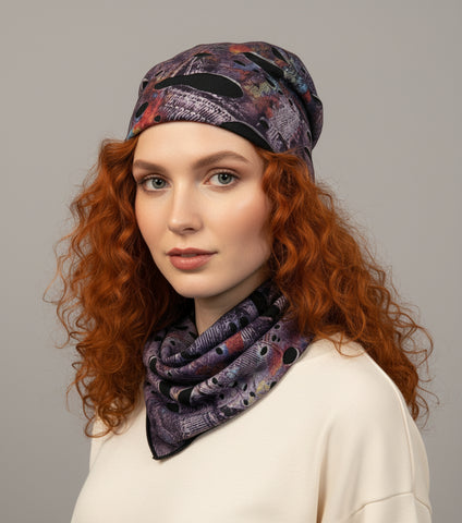 a patterned headscarf and scarf on an orange background