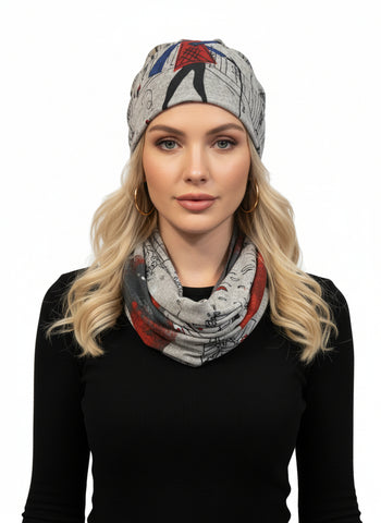 Model wearing a grey patterned beanie and hat set. 