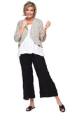 Woman wearing a beige jacket, white top, black pants, and black sandals on a white background