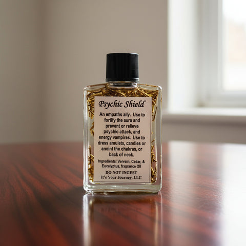 Bottle labeled 'Psychic Shield' with a white label on a white background