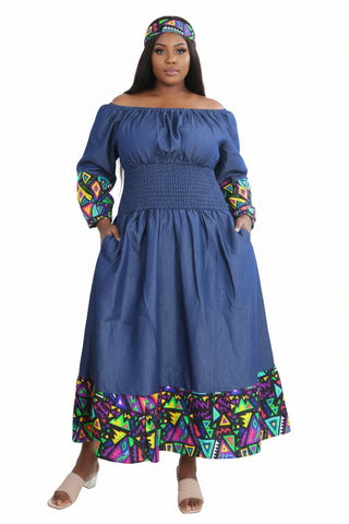 Woman wearing a blue off-shoulder dress with colorful geometric patterns on a white background