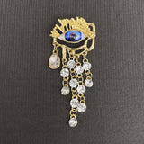 Rhinestone Fringe Eye Brooch