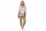 Light gray sweater with a cat print on a hanger against a white background