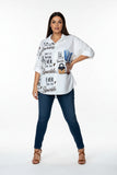 White shirt with motivational text and graphics on a hanger against a white background