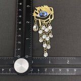 Rhinestone Fringe Eye Brooch